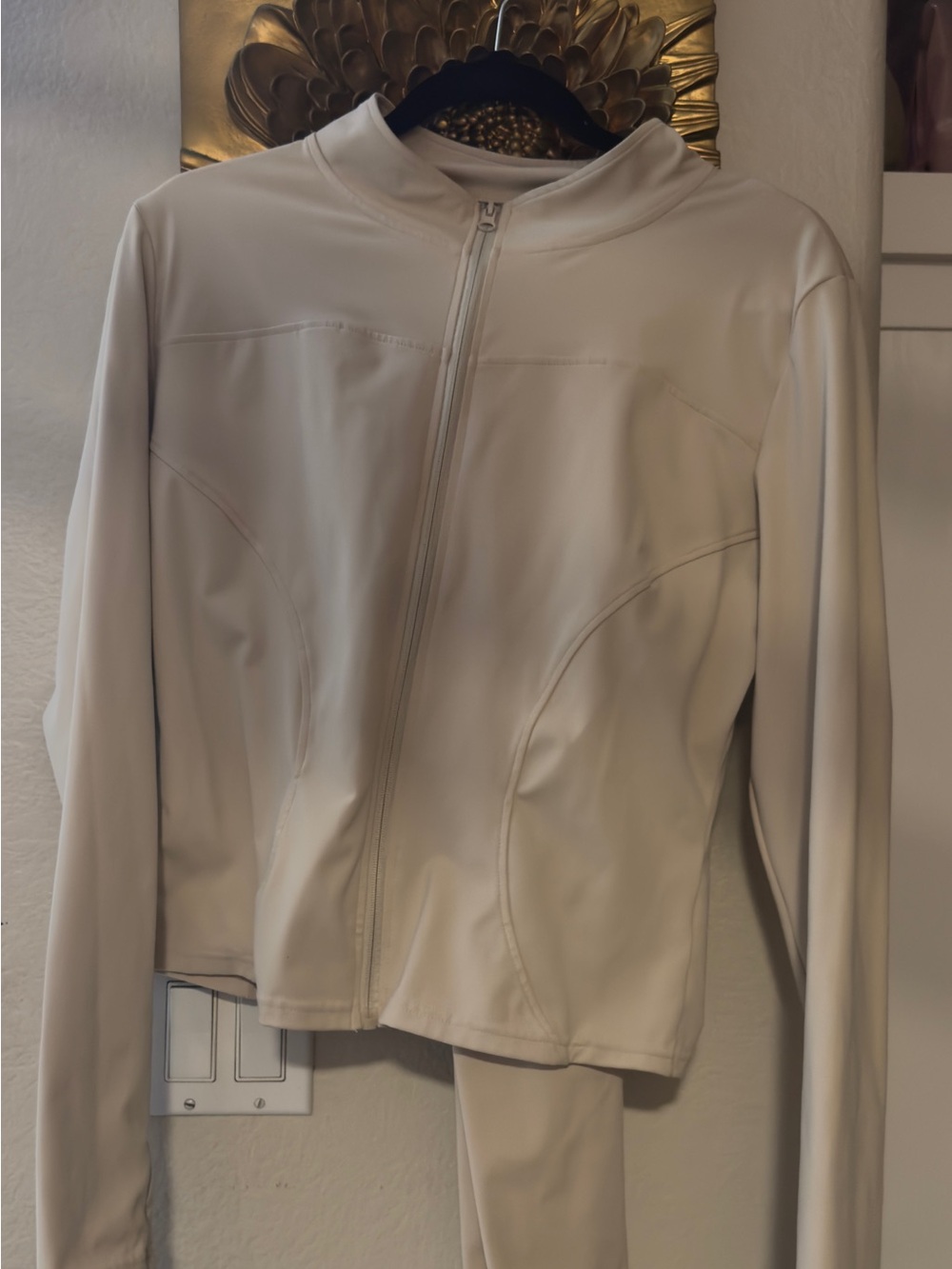 Light Cream Warm up jacket and leggings.